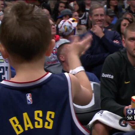 Nikola Jokić gives a wink and a smile to a young Nuggets fan-“Nikola Jokić Winks and Smiles at Young Nuggets Fan”