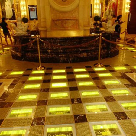 Macau’s Grand Emperor Turns Iconic Solid Gold Walkway into Cash-“Macau’s Grand Emperor Transforms Iconic Gold Walkway into Profit”