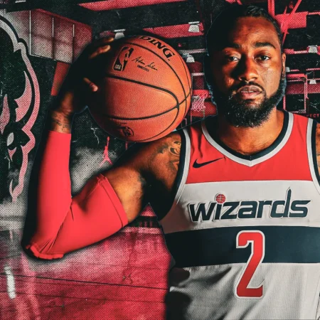 John Wall Visit Sparks Howard’s Dominant Win-“John Wall’s Visit Ignites Howard’s Dominant Victory”